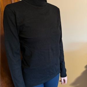 Classic black turtleneck sweater,